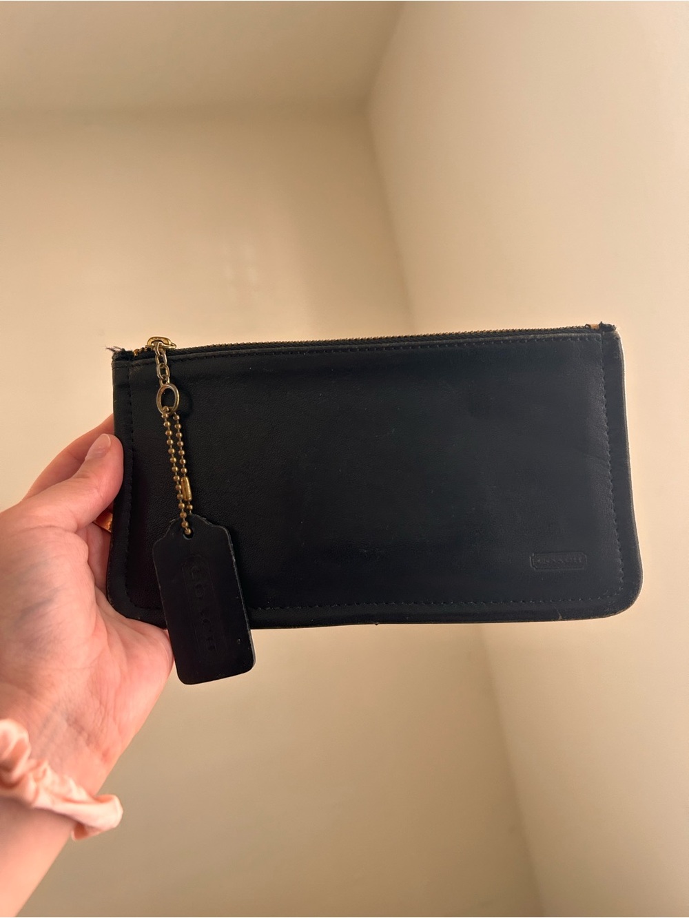 Vintage Coach black leather skinny pouch